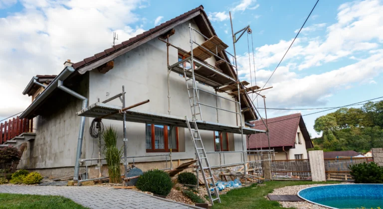 House exterior with scaffolding during renovation